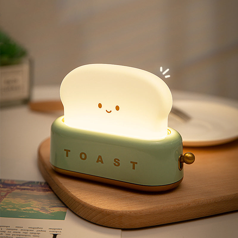 https://kawaiipenshop.com/cdn/shop/products/Mini-Toaster-Desk-Light-Kawaii-Bread-Lamp-Night-Light-Cute-12_1024x1024.jpg?v=1671546506