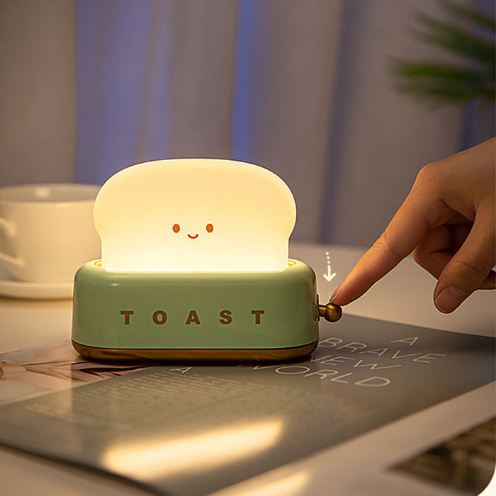 https://kawaiipenshop.com/cdn/shop/products/Mini-Toaster-Desk-Light-Kawaii-Bread-Lamp-Night-Light-Cute-4_1024x1024.jpg?v=1671546506